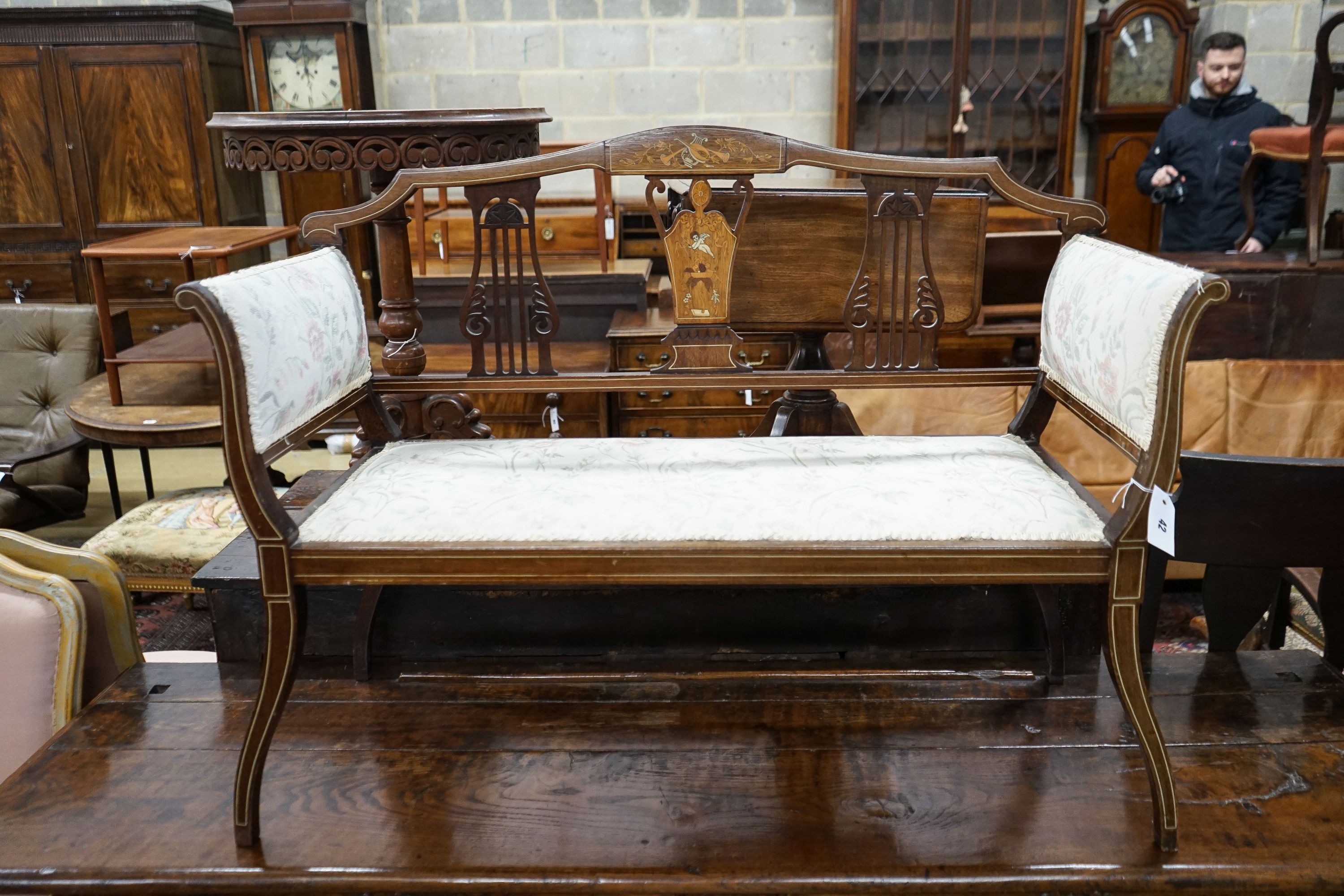 An Edwardian marquetry inlaid mahogany window seat, length 107cm, depth 44cm, height 79cm